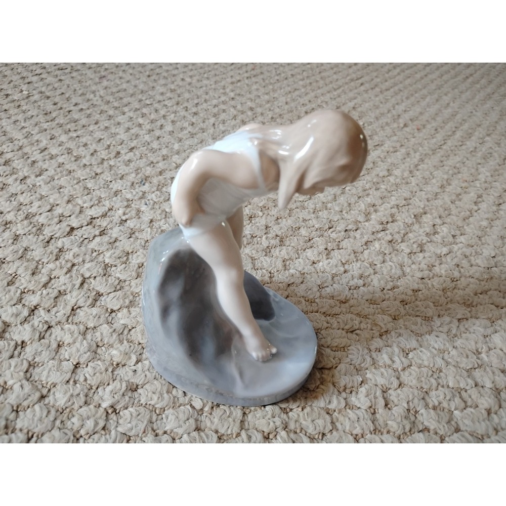 vintage Royal Copenhagen porcelain figurine titled "Bathing Girl" Model No. 1229